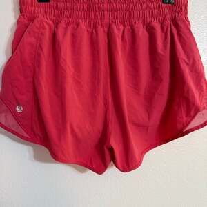 Lululemon Hotty Hot Low Rise Lined Short 2.5" Lip Gloss Hot Pink running 6